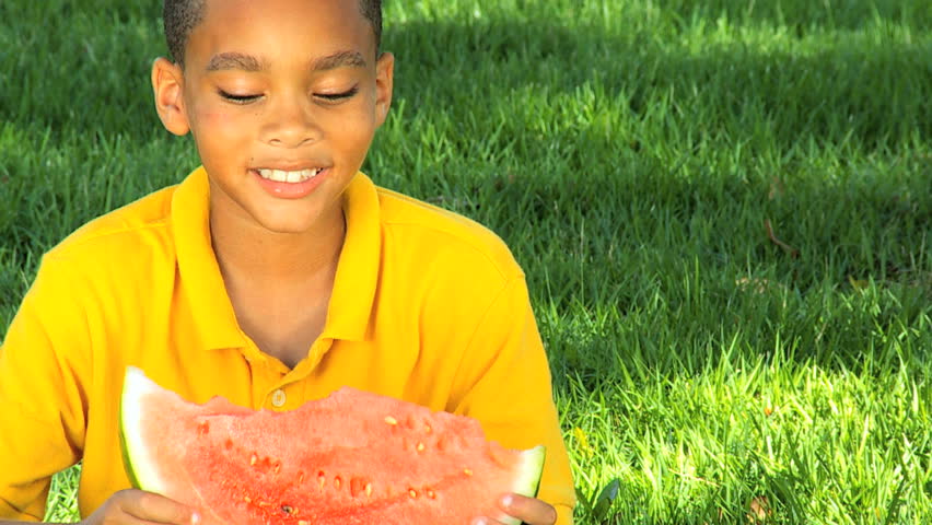 African American Child Eating Refreshing Water Melon