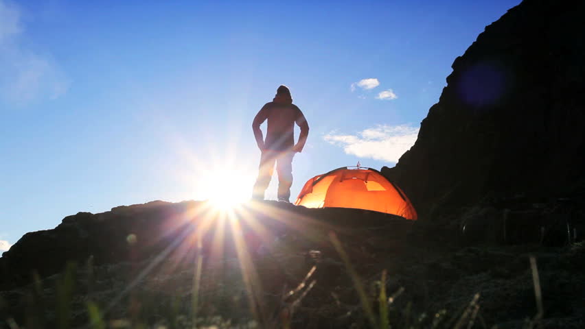 Hiker in Dawn Silhouette on Hiking Expedition