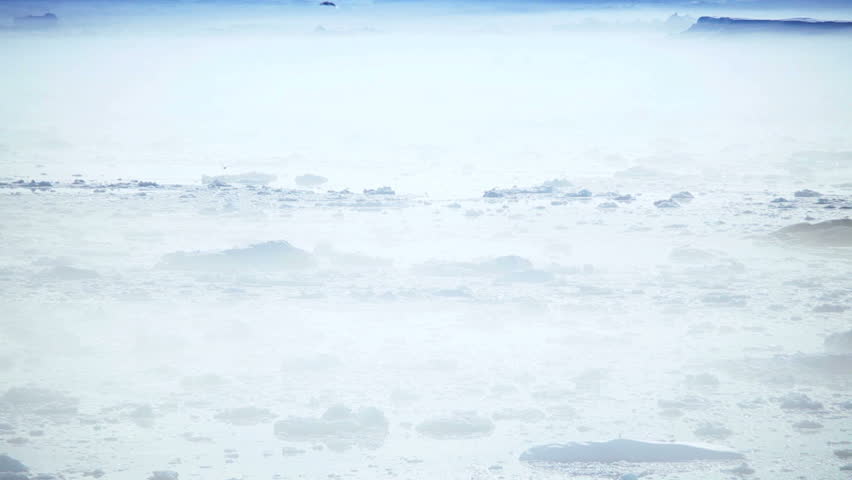 Nautical Vessel Moving in Ice Floes