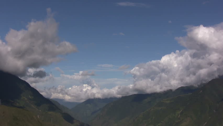 Clouds moving past the summit of Tungurahua Volcano, Ecuador