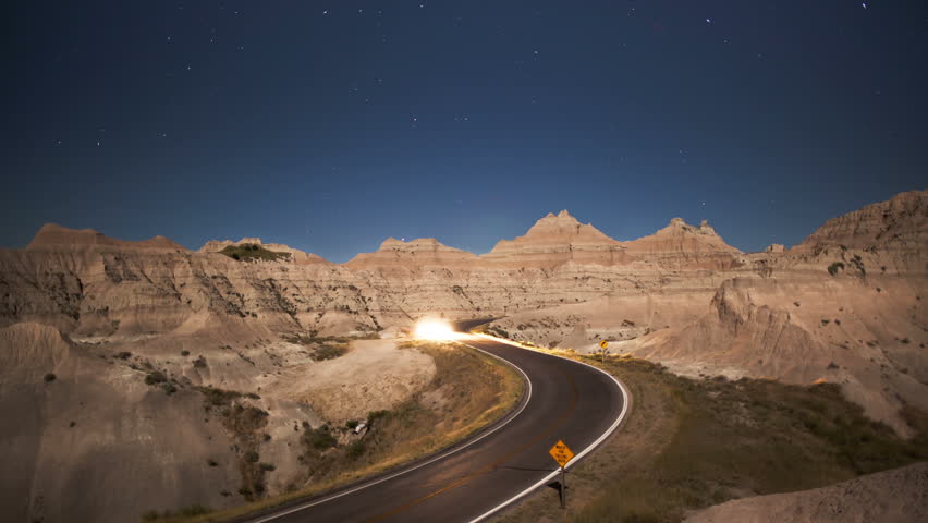 Night timelapse of traffic in the Badlands, South Dakota