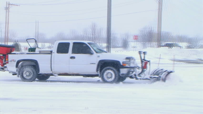 Truck Plowing Snow 