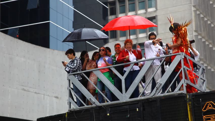 SAN PAULO, BRAZIL - CIRCA JUNE 2011: Crowds celebrate the LGBT Gay Pride Parade on Avenida Paulista circa June 2011 in San Paulo.