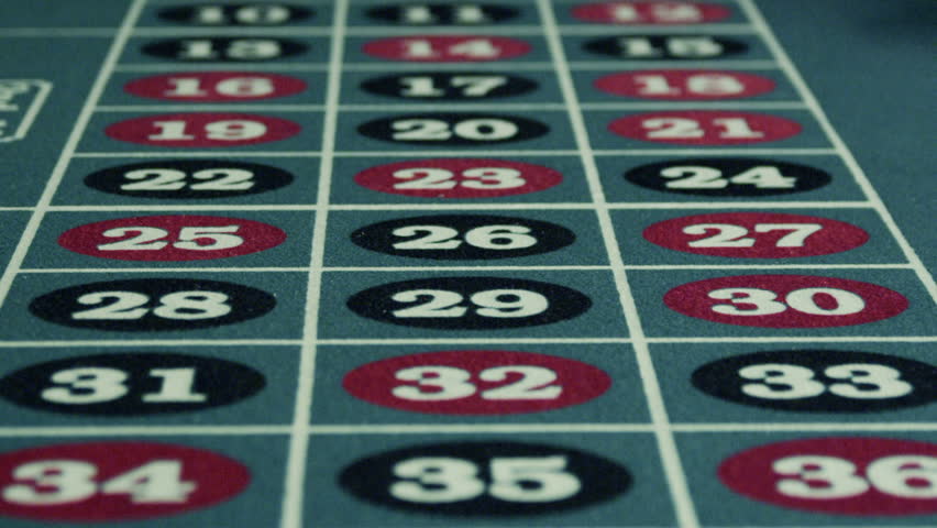 Spinning chips on a roulette table.