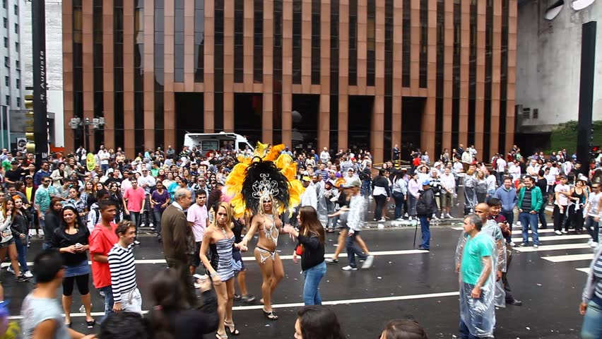 SAN PAULO, BRAZIL - CIRCA JUNE 2011: Crowds celebrate the LGBT Gay Pride Parade on Avenida Paulista circa June 2011 in San Paulo.