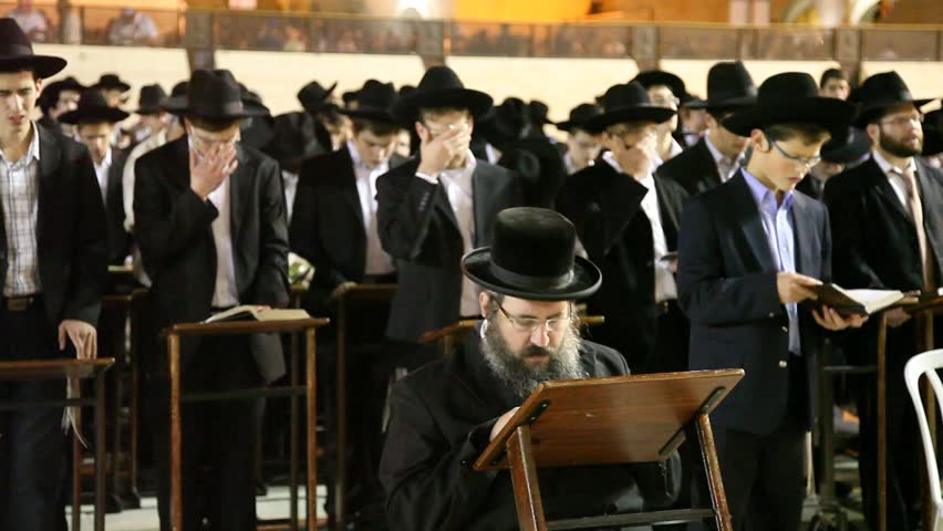 JERUSALEM, ISRAEL - OCT 6, 2011: Yeshiva students pray during Slihot at the Western Wall on October 6, 2011 in Jerusalem.