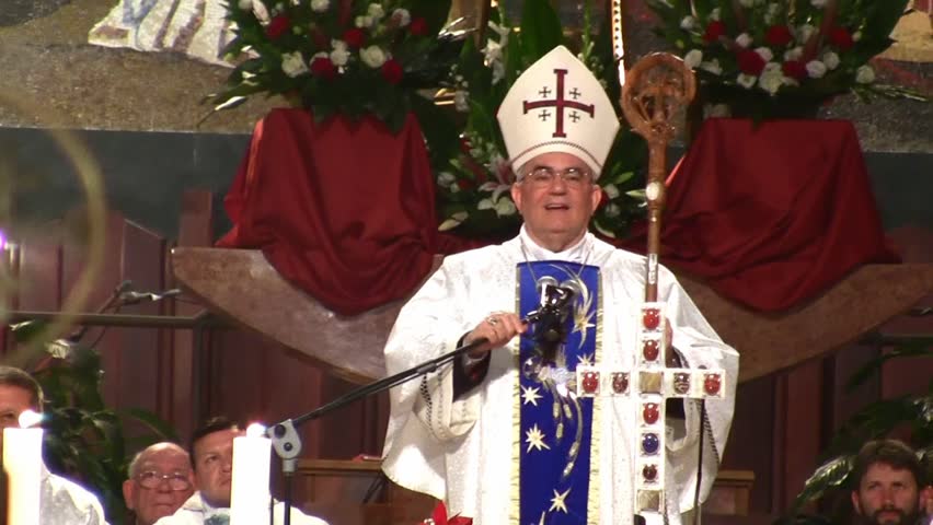 NAZARETH, ISRAEL - DEC 24, 2008: Priest gives French salutation at the Basilica of Annunciation on December 24, 2008 in Nazareth.