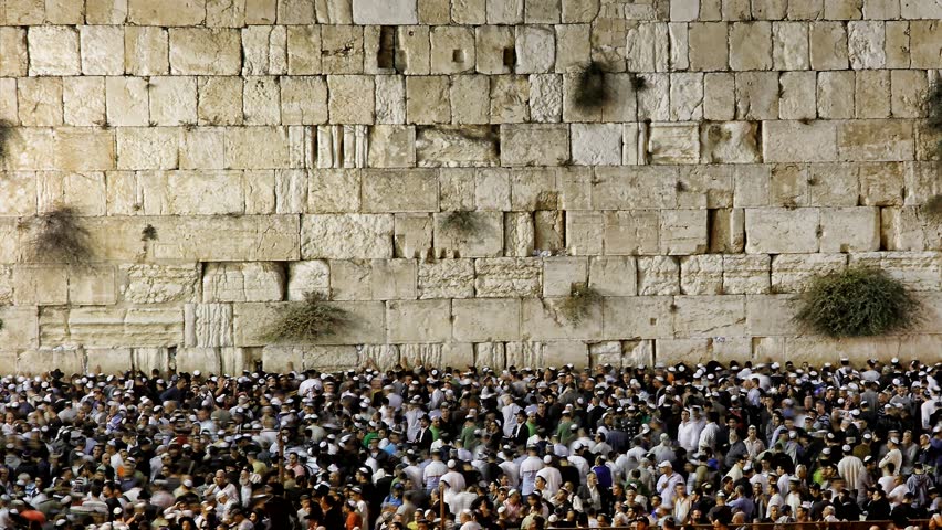JERUSALEM, ISRAEL - OCT 6, 2011: Timelapse of the Western Wall as Orthodox Jews pray around midnight on October 6, 2011 in Jerusalem.
 