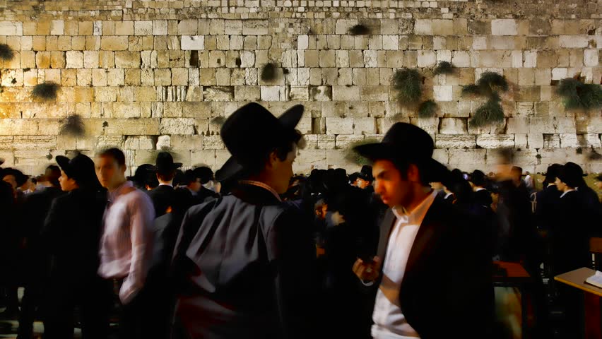 JERUSALEM, ISRAEL - OCT 6, 2011: Timelapse of Yeshiva students dancing by the Western Wall on October 6, 2011 in Jerusalem.
 