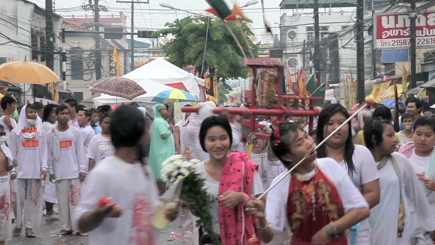 THAILAND - OCTOBER 3: Local people and volunteers in the vegetarian festival parade on October 3, 2011 Phuket island, Thailand. The Vegetarian Festival is an annual festival in Phuket.