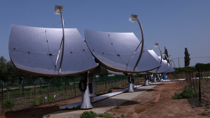 Slider dolly move toward and slightly down to a row of solar panels at the Zenith Solar Plant at Kibbutz Yavne, Israel.