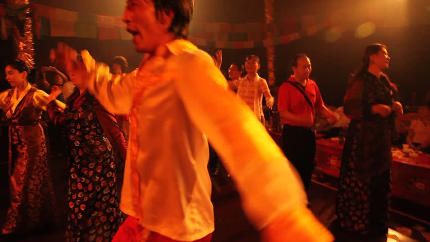 MOXI, CHINA - AUG 1, 2009: An event features Tibetan-Chinese folk dancing on August 1, 2009 in Moxi.