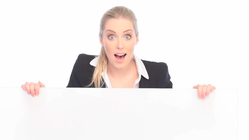 Surprised Businesswoman And Blank Sign, wide eyed businesswoman holding blank white sign.