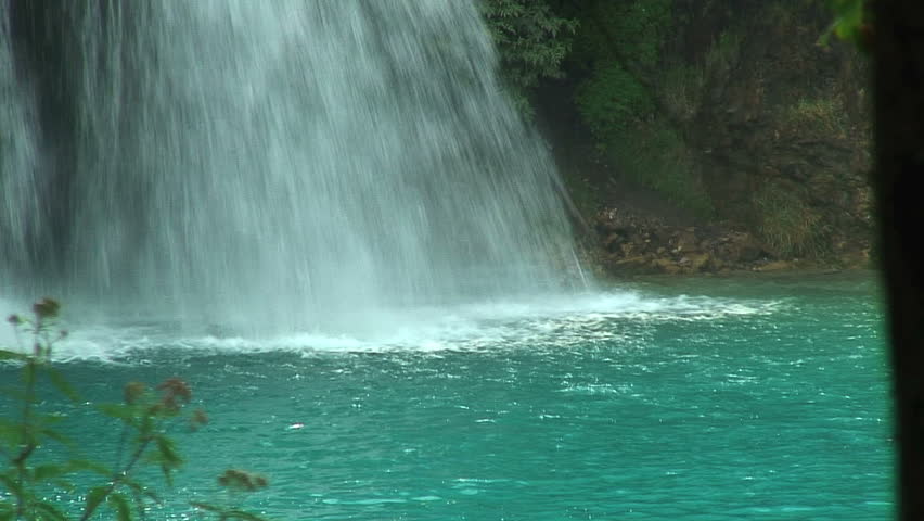 Zoom-Out: Waterfalls Dumping into Lake