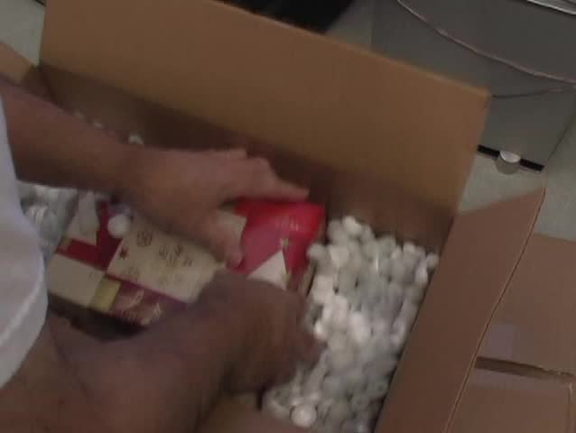 Packing a Christmas gift for shipment
