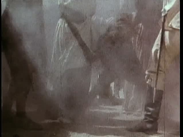 Peasant hitting soldiers during street fight