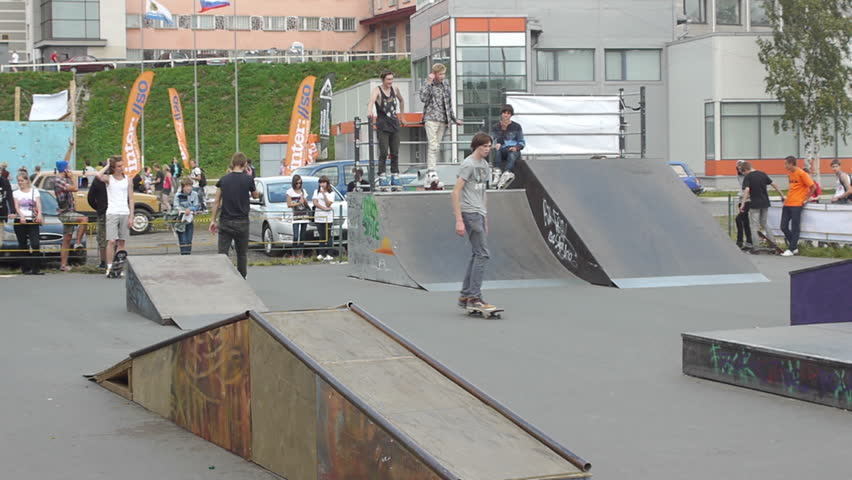 PETROZAVODSK, RUSSIA - AUGUST 27: Anonymous roller bladers and skateboarders making tricks during Extreme Side festival on August 27, 2011 in Petrozavodsk, Russia. Event was free for watching, shooting and participating