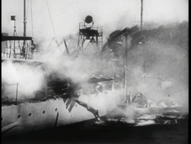 Men abandoning ship as it sinks