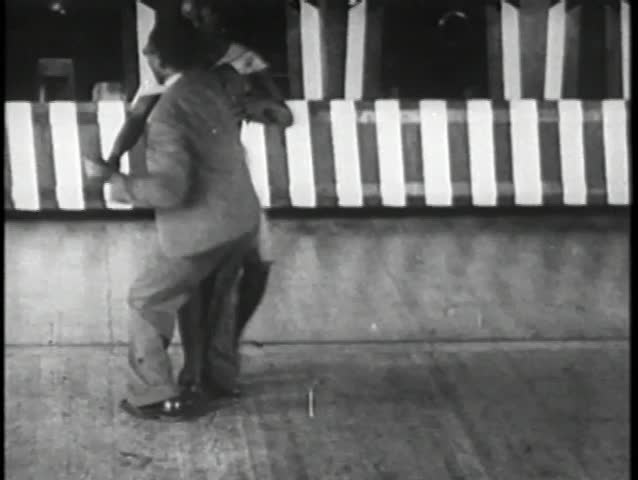 African American couple swing dancing, 1930s