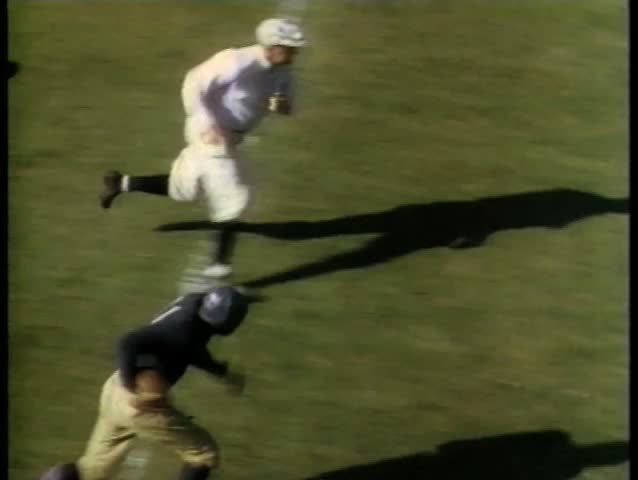 College football player heading for touchdown