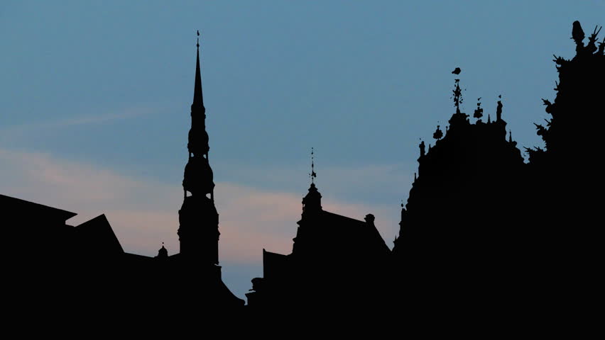 Latvia UNESCO Historic Centre of Riga moonrise. Vecriga, the Old Riga, is the historical center of Riga, located on the east side of Daugava River.