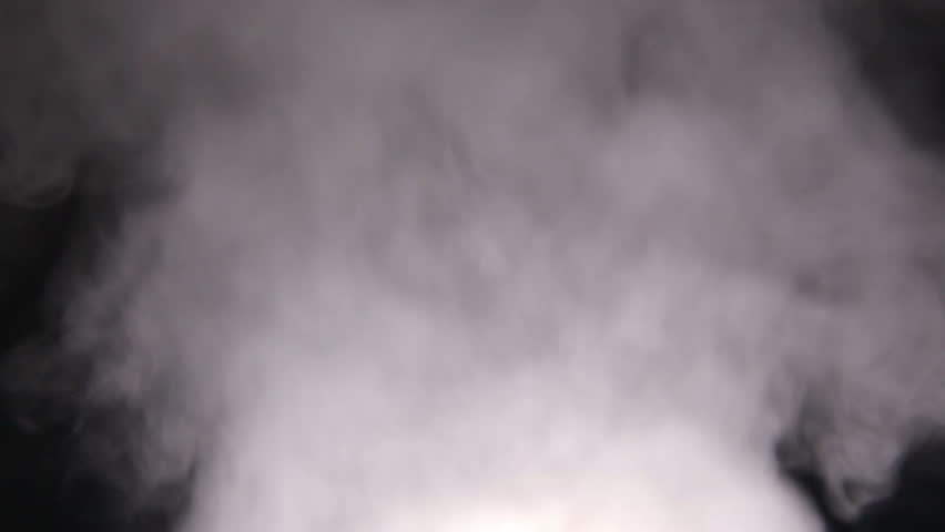 Humidifier emits smoky vapors in dark room at night