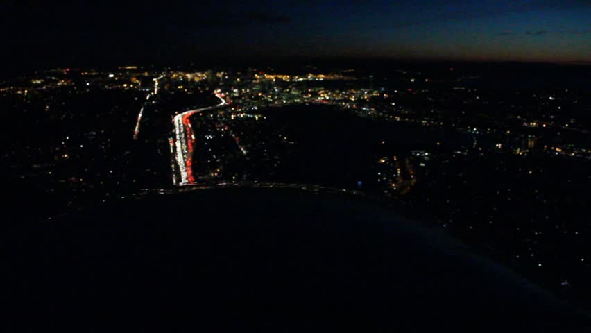 High-speed time lapse from low-flying airplane over downtown Seattle, WA and landing at Boeing Field