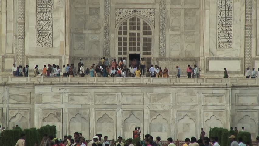 AGRA, INDIA - AUGUST 16, 2006: A crowd gathers at the Taj Mahal  in Agra, India