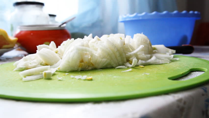 cut onions with a knife