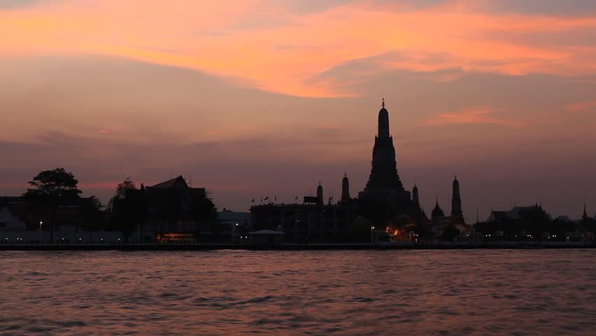 Time Lapse of Wat Arun, Buddhist Temple of the Dawn in Bangkok, Thailand, Chao Phraya River