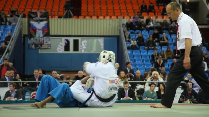 MOSCOW - FEBRUARY 19: Sportsman Ontgontseren from Mongolia wins sportsman Wasinhal from India in Olympiysky Sports Complex at World Cup 2011 KUDO on February 19, 2011 in Moscow, Russia. 