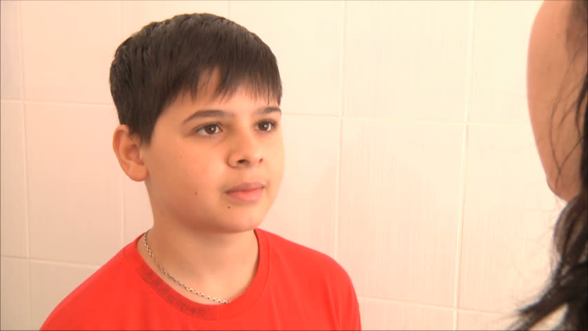 doctor examines the boy his throat 2