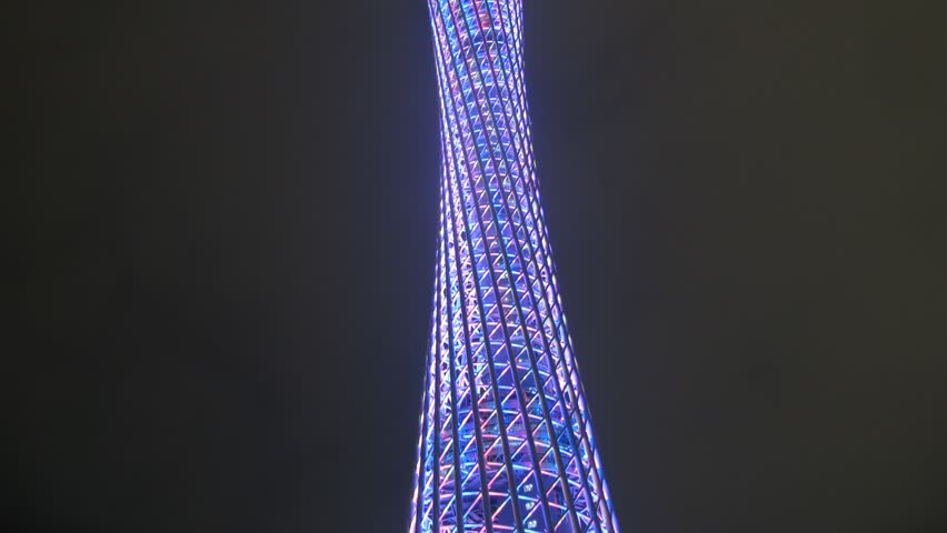 GUANGZHOU - NOV 23: (Timelapse View) Guangzhou TV tower stands at center against night sky on Nov 23, 2011 in Guangzhou, Guangdong, China.