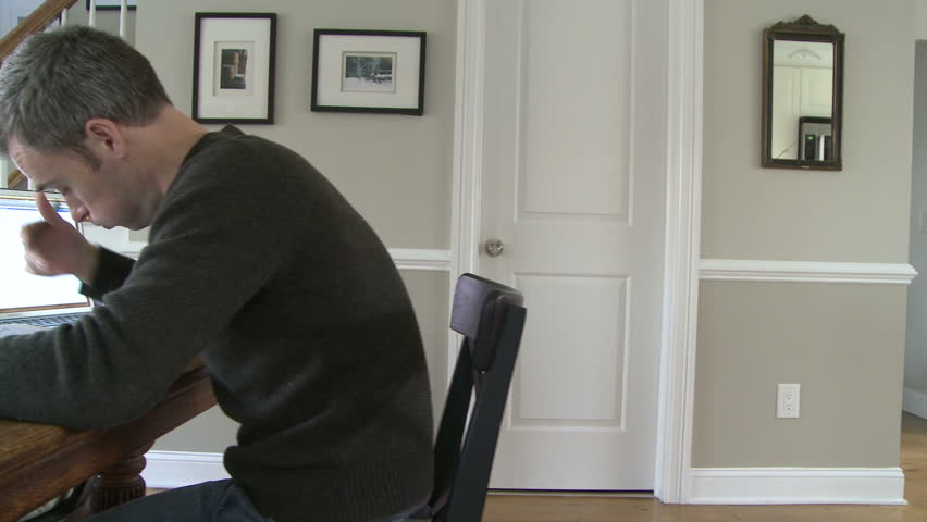 Man working on bills and finances