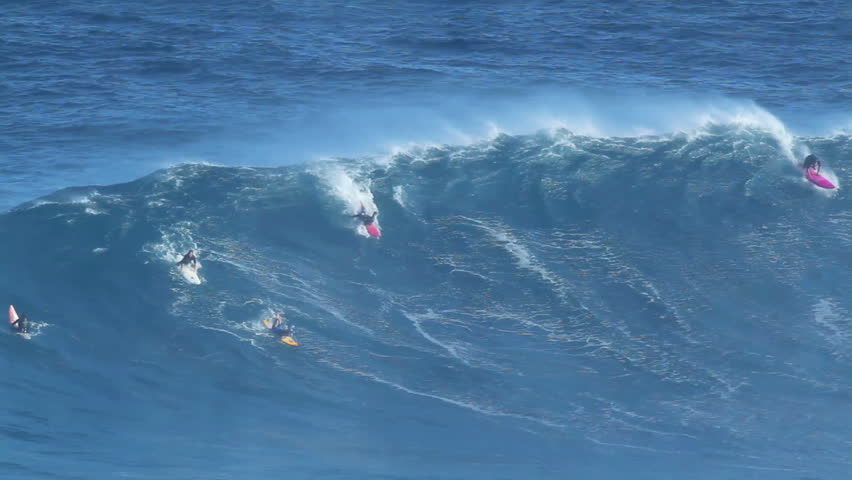 MAUI, HI - January 31: Professional surfer Greg Long rides a giant wave at the legendary big wave surf break known as "Jaws" during one the largest swells of the winter January 31, 2012 in Maui, HI.
