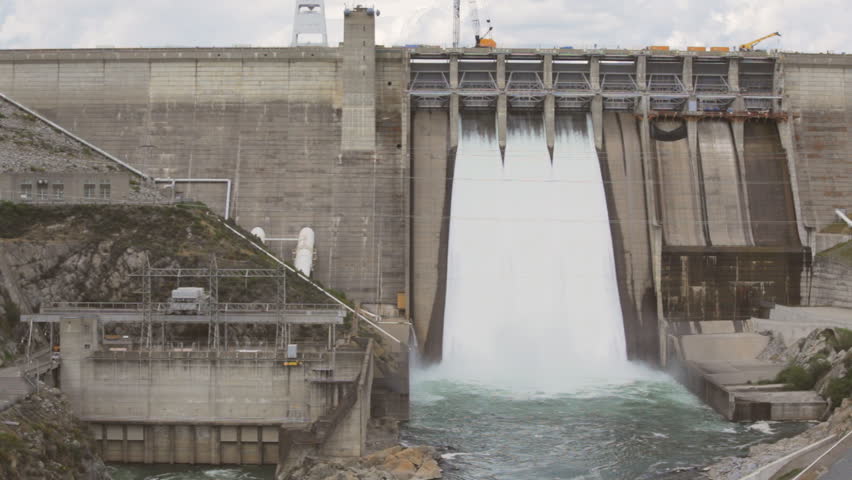 Closeup, tilt down of the spillway of the Folsom dam (includes audio).