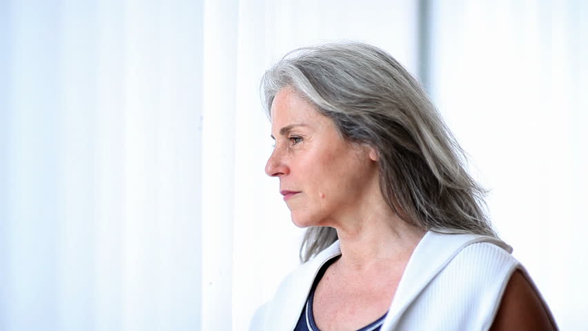 Pensive senior woman; Full HD Photo JPEG