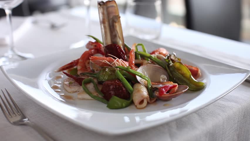 Prawn with vegetables and clams. 360 rotation food