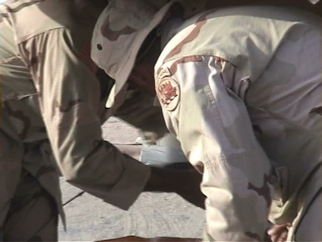 CAMP UDAIRI, KUWAIT - 4/22/03: Mail call for U.S. Army Rangers.