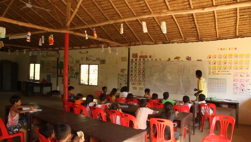 KO CHANG, THAILAND - JANUARY 6: Students learning in a school sponsored by Cambodian Kids Care, January 6, 2012 in Ko Chang, Thailand. Cambodian Kids Care is a program that provides kindergartners in deprived areas with education. 