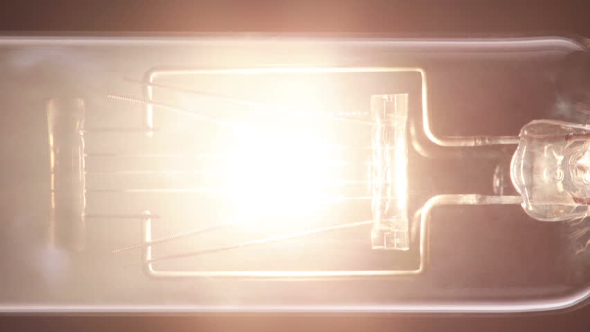 Close up projector light bulb fade up and down