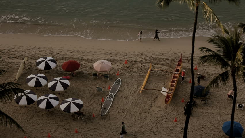aerial view of early morning tourists at Waikiki beach in Oahu Hawaii