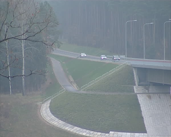 Large high bridge over river and cars ride it. Architectural decisions

