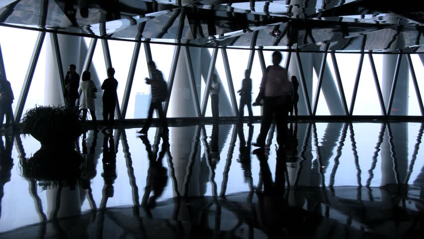 GUANGZHOU - NOV 24: (Timelapse View) Visitors walk and take photographs inside Canton television tower on November 24, 2011 in Guangzhou, Guangdong, China.
