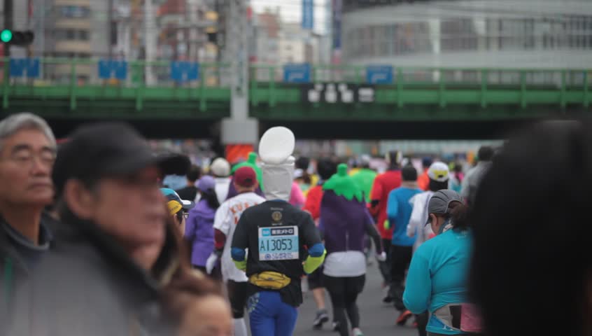 TOKYO - FEBRUARY 26: Unidentified athletes in the Tokyo Marathon on February 26, 2012 in Tokyo, Japan. With more than 36,000 participants the annual marathon is the country's biggest event.
