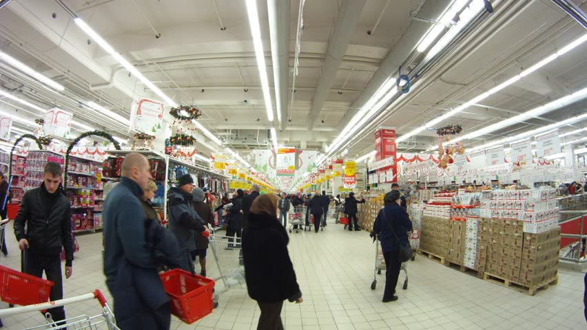 MOSCOW - DEC 21: (Timelapse View) People make purchases in shopping center European, on Dec 21, 2011 in Moscow, Russia. Russian spending in the week leading up to the big New Yearâs holiday was 16 per cent higher this year than in 2010.