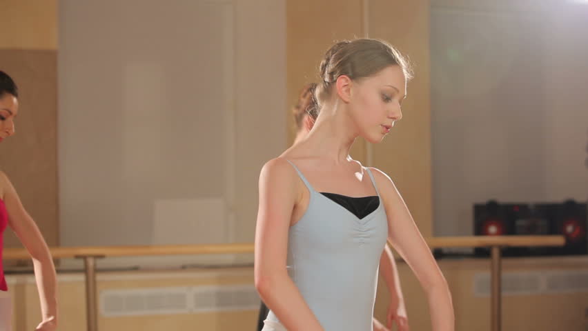 Several dancers performs jazz-modern dance