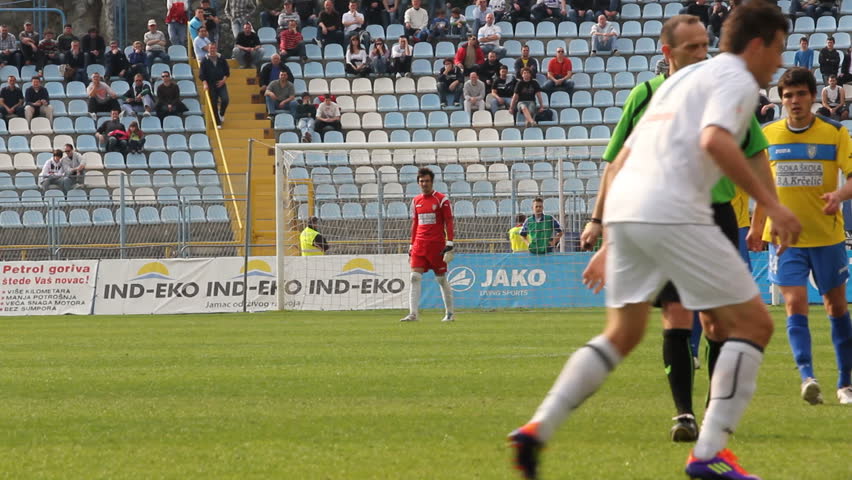 RIJEKA, CROATIA - MARCH 25: soccer match between HNK Rijeka and NK Inter Zapresic (1. Croatian Football league) Niko Datkovic (Rijeka) fouled Ante Budimir (Inter Z.) on March 25, 2012 in Rijeka, Croatia.