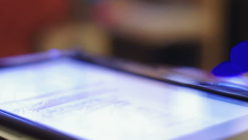 looking at pictures on touchscreen tablet-pc
