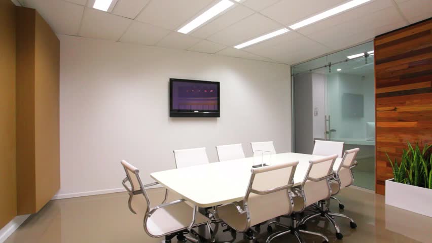 Stylish new board room with table, chairs and LCD display.